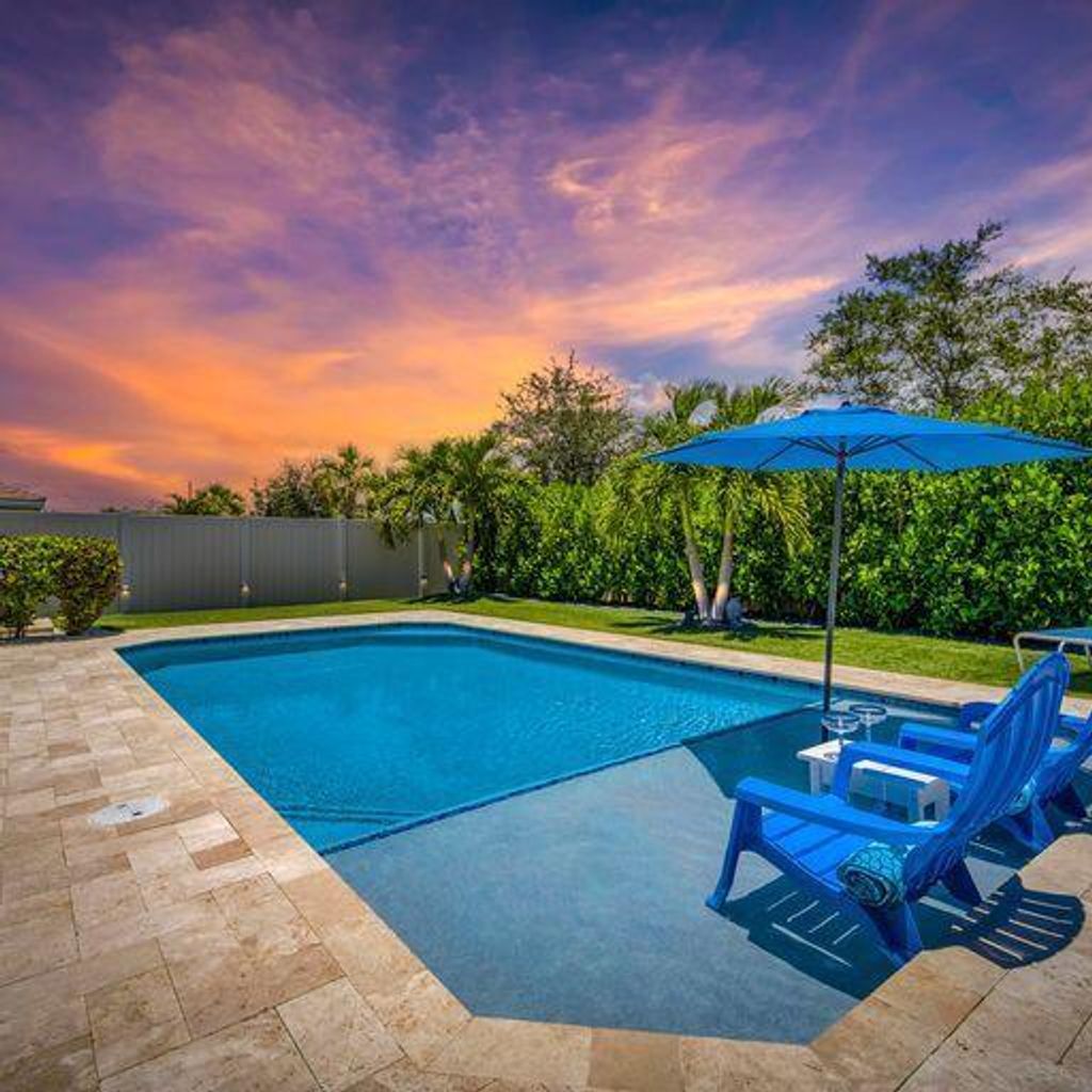 Photo of 7681 SW Harbor Cove Drive, Stuart, FL 34997 (MLS # R10902886)