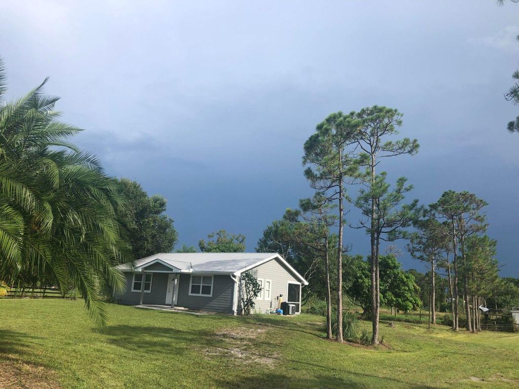 Photo of 6754 SW 39th Street, Palm City, FL 34990 (MLS # R10694174)