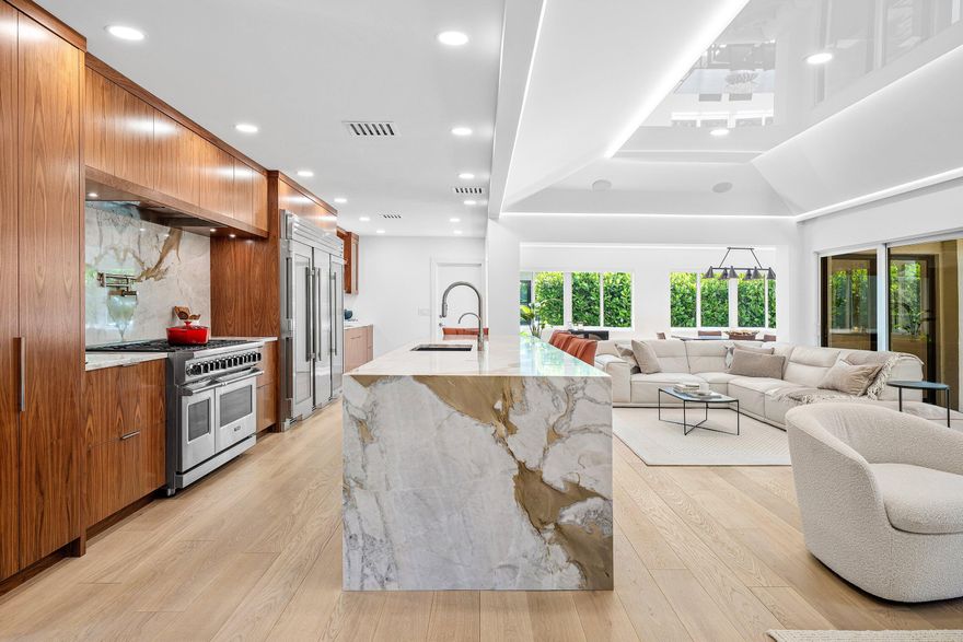 A Masterpiece in Manalapan Where Art Meets Architecture — Entry-Level Pricing, Ultra-Luxury Living. Welcome to 16 Little Pond, a true design-forward jewel nestled in the prestigious, gated and ultra-private town of Manalapan, now recognized as the next Palm Beach for its ultra exclusivity, security, and lifestyle offerings. This completely reimagined 2-bedroom, 2.5-bath residence is more than a home — it's a work of art, with finishes and craftsmanship rivaling $30M+ estates across the street on the oceanfront. Meticulously renovated from the ground up, this residence was stripped down and rebuilt to achieve architectural excellence and modern sophistication. With over 2,000 square feet of bespoke interiors, covered lanai, custom millwork, and structural enhancements, every inch has been curated for discerning buyers seeking highest end style, privacy, and effortless living. Turn key luxury.

Highlights Include:
    "    Fully re-engineered with steel I-beam reinforcement, waterproofing, pest-proofing, and drainage solutions for long-term durability.
    "    Garage upgraded to luxury-car standards with custom finishes, exterior drainage and A/C system.
    "    French white oak flooring (1.25" thick) laid over new subflooring for a grounded, gallery-like atmosphere.
    "    Custom stretch ceilings, recessed and ambient lighting, electric blinds, and integrated smart systems.
    "    Open-concept chef's kitchen with a floating island, $150K custom walnut and crotch wood cabinetry, highest-end gas appliances, and a 150-bottle wine cabinet with a triple-filtered ice maker.
    "    Converted 2 bed / 2 bath into a more functional 2 bed / 2.5 bath layout, including a spa-like guest bath with wet room, soaking tub, infinity drain, and dramatic natural light.
    "    Designer closets, steel-wool insulated walls for soundproofing, and fully wired smart home tech including integrated wireless premium sound and surveillance.
    "    Landscape redesign for unobstructed backyard views and seamless indoor-outdoor flow including 27 KW Generac generator.

A Manalapan Address Like No Other

As a resident of Manalapan, you will receive an exclusive private membership to the world-renowned La Coquille Club, located within the five-star Eau Palm Beach Resort & Spa  just a short stroll from your front door. Enjoy beachfront cabanas, fine dining, full-service spa privileges, and social exclusivity that few communities in South Florida can offer.
You are moments from Worth Avenue, elite golf clubs, and the best of Palm Beach living  all while tucked away in a secure, serene enclave that defines the next era of luxury.

The Opportunity

Whether you're searching for a sophisticated pied-à-terre, a private seasonal getaway, or a low-maintenance luxury residence, 16 Little Pond offers entry-level access into one of South Florida's most coveted zip codes  with no compromise on quality or design.

Experience Manalapan. Elevate your lifestyle. Make this living masterpiece your home.