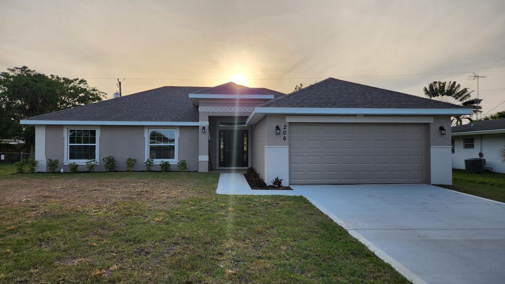 Photo of 233 SW Becker Road, Port Saint Lucie, FL 34953 (MLS # R11111401)