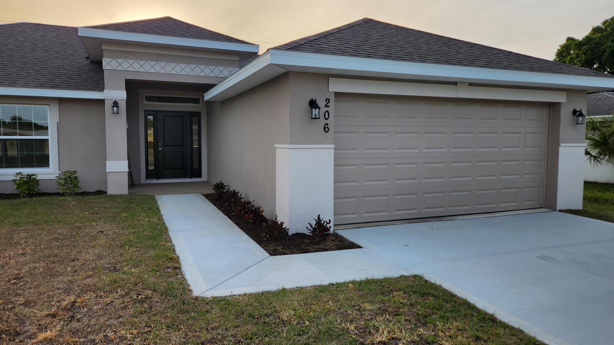 **Pre-Construction** Winter Availability (Dec. 2025 - Feb. 2026) FLEX CASH AVAILABLE! ONLY $1,000 DEPOSIT. Save yourself several thousands of dollars in CLOSING COSTS WHEN USING SELLER'S APPROVED LENDER. (Sample photos used) & will feature 4 bedrooms, 2 bathrooms large walk in shower and a 2-car garage with vaulted ceilings, tile in main living areas. Offering quick access to shopping, dining, beaches & Tradition Square. Builder warranty Included.