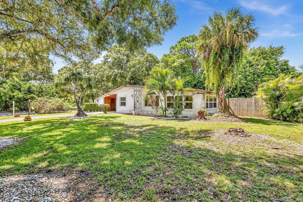 Photo of 3041 Pioneer Circle, Fort Pierce, FL 34982 (MLS # R11015462)