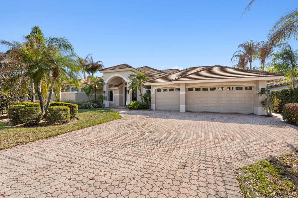 Photo of 5180 SW Hammock Creek Drive, Palm City, FL 34990 (MLS # B26007425)