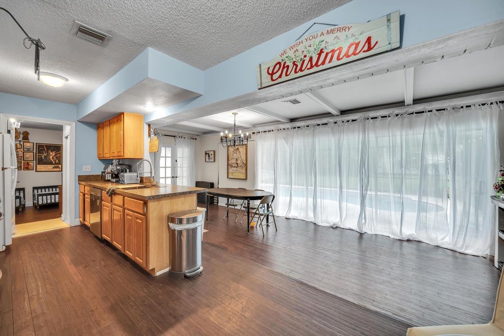 Photo of 719 NE Perch Lane, Port Saint Lucie, FL 34983 (MLS # R10954441)