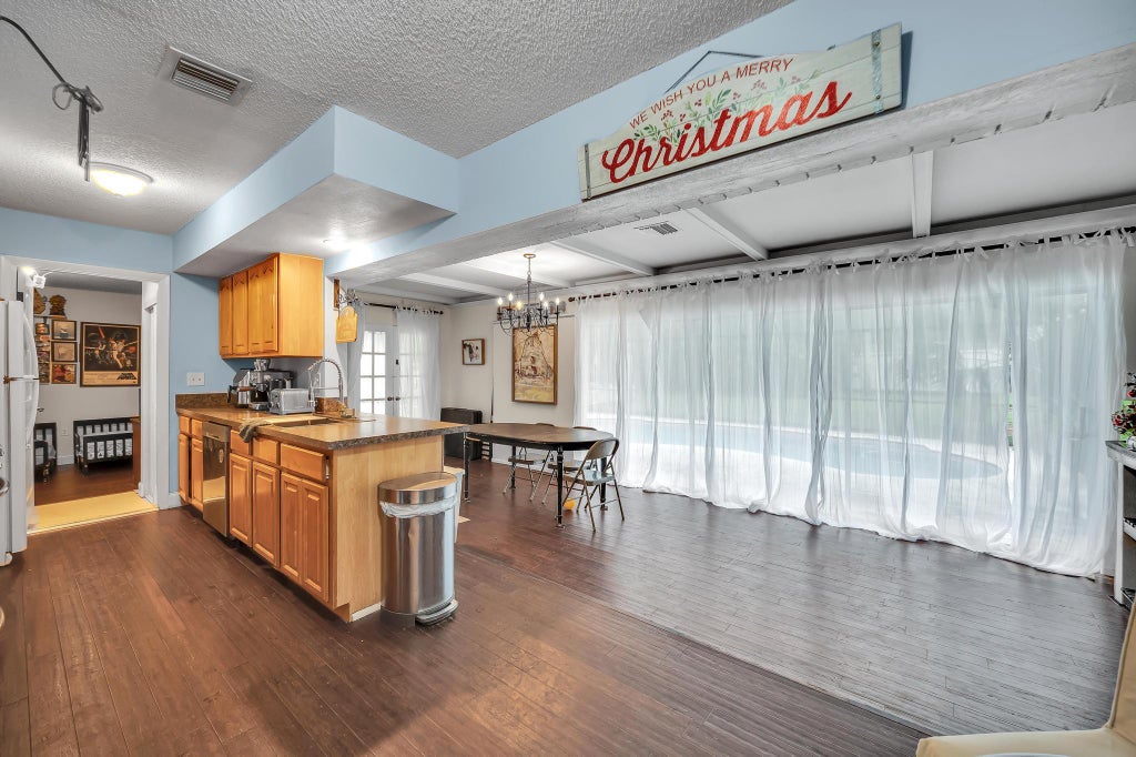 Photo of 719 NE Perch Lane, Port Saint Lucie, FL 34983 (MLS # R10954441)