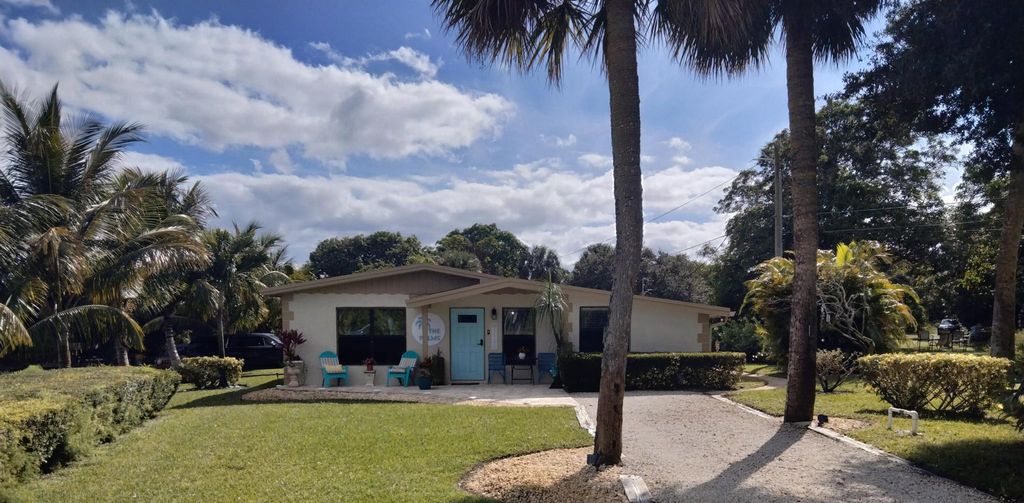 Photo of 1150 NE County Line Road, Jensen Beach, FL 34957 (MLS # R11142637)