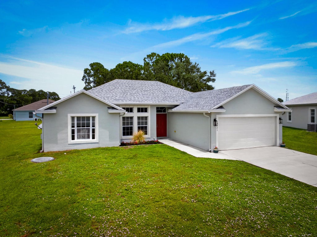Photo of 2325 SW SALMON Road, Port Saint Lucie, FL 34953 (MLS # B26059385)