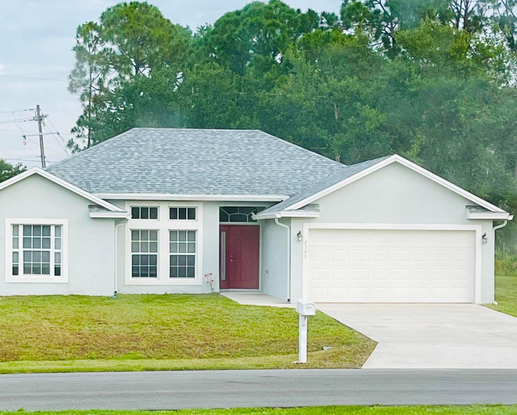 Photo of 2325 SW SALMON Road, Port Saint Lucie, FL 34953 (MLS # B26059385)