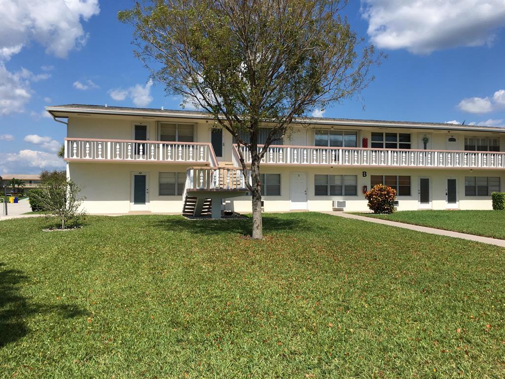 Cute 1st Floor Condo in 55+ Active Community. Wood Floors, newer kitchen cabinets and freshly painted! Outdoor covered enclosed patio. Wall a/c. Century Village has fantastic multi-million dollar amenities and 24 hour gated security. Amenities include courtesy buses, tennis, billiards, social clubs, sailing, Grand Theater, many pools, state of the art fitness center and More! Fantastic location close to WPB airport, major highways and the Palm Beach Outlets.