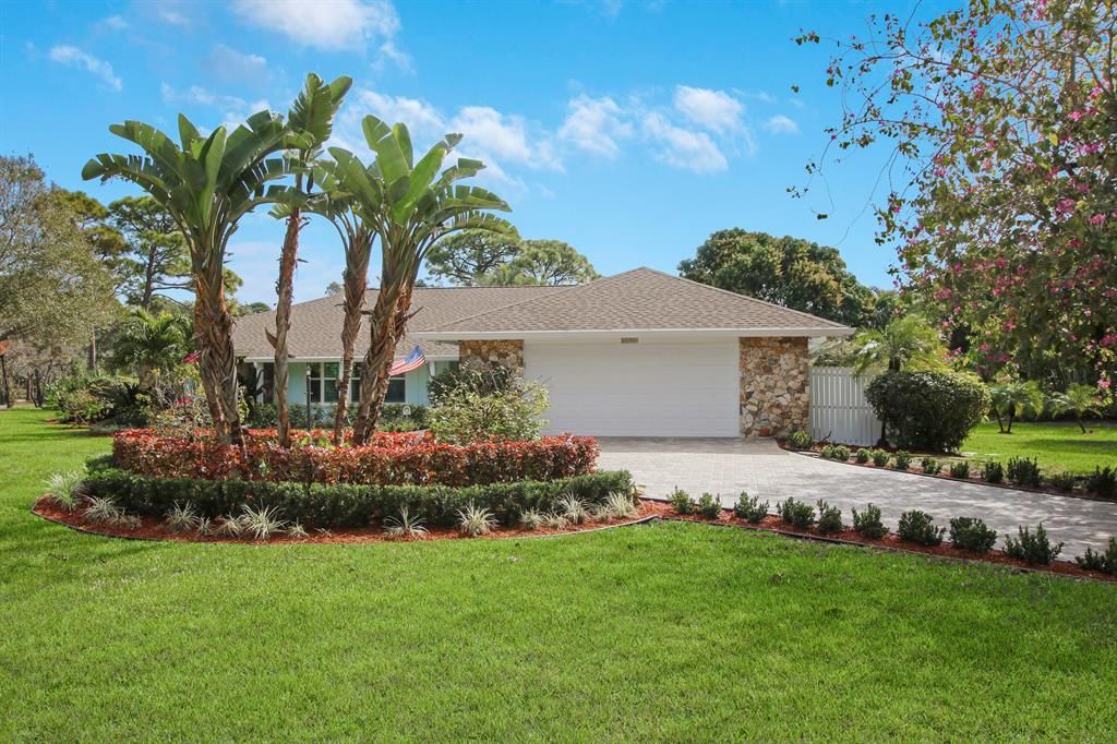 Photo of 6498 Fox Run Circle, Jupiter, FL 33458 (MLS # R10688663)