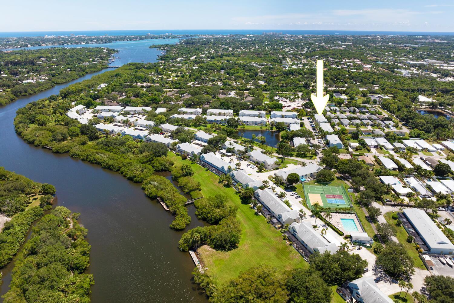 Life at Riverwalk is about more than a home, it's about lifestyle. This 2-bedroom, 2.5-bath townhome places you in one of Jupiter's most loved waterfront communities, where residents enjoy three pools, tennis, pickleball, basketball, volleyball, horseshoes, playgrounds, and endless green space along the Intracoastal for morning walks or evening sunsets. Boaters and water lovers appreciate the private ramp, kayak and paddleboard storage, plus five community docks on the Loxahatchee River. Inside, the townhome offers a spacious floor plan with open living, private bedrooms, and the peace of mind of hurricane-impact windows. Riverwalk is also pet friendly, even big dogs are welcome making this a rare opportunity to enjoy comfort, security, and Florida lifestyle all in one.