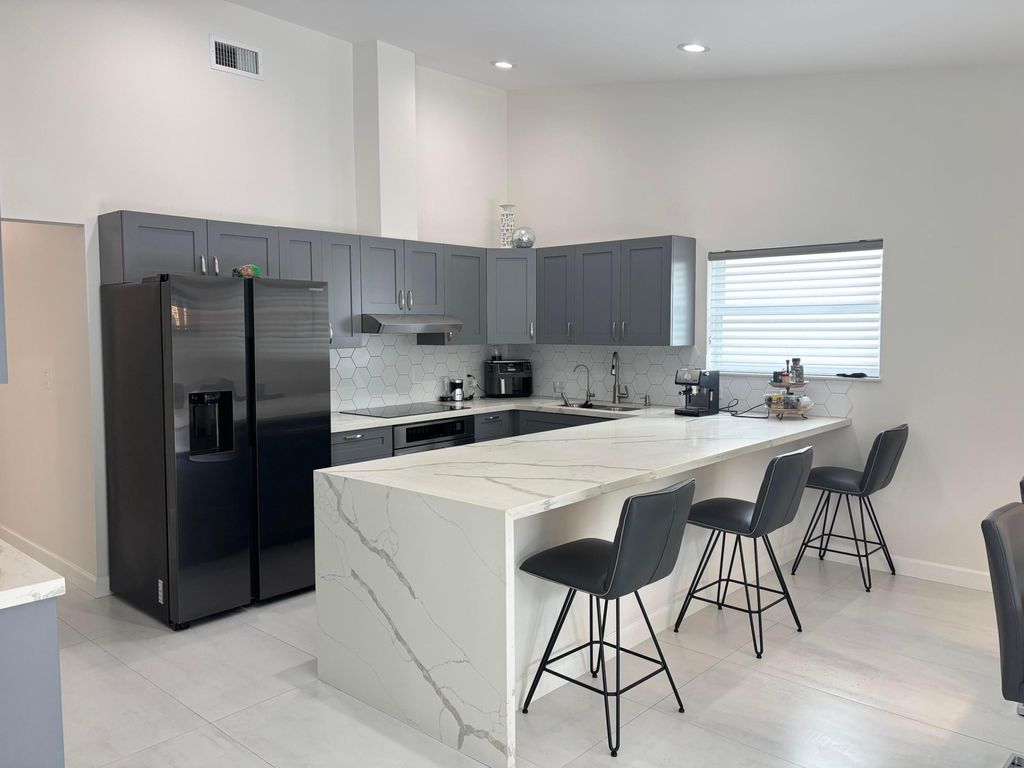 Photo of 330 Sandalwood Lane, Boca Raton, FL 33487 (MLS # B26023287)