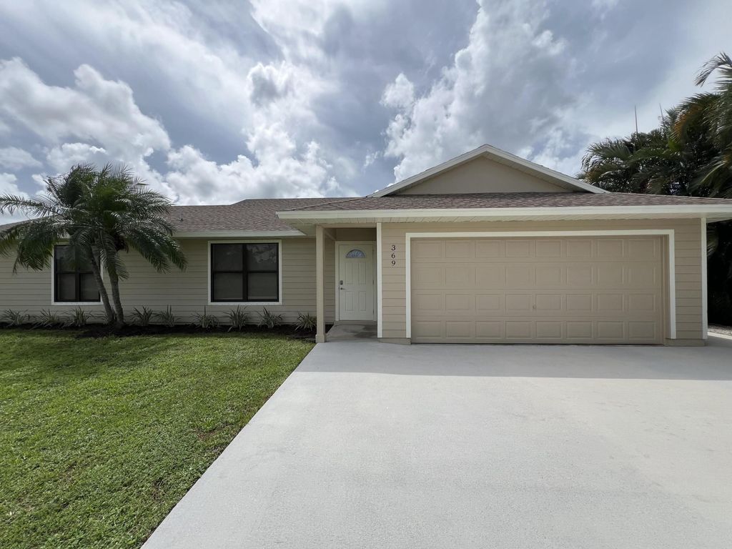 Photo of 369 SW Ridgecrest Drive, Port Saint Lucie, FL 34953 (MLS # R11019521)