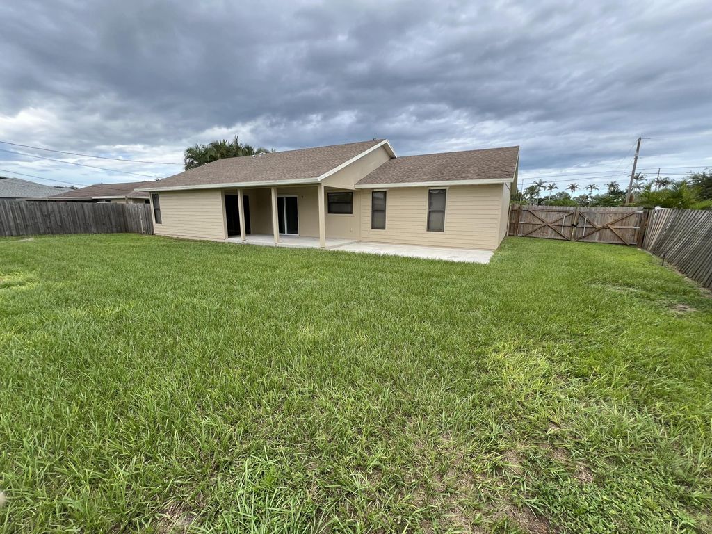 Photo of 369 SW Ridgecrest Drive, Port Saint Lucie, FL 34953 (MLS # R11019521)