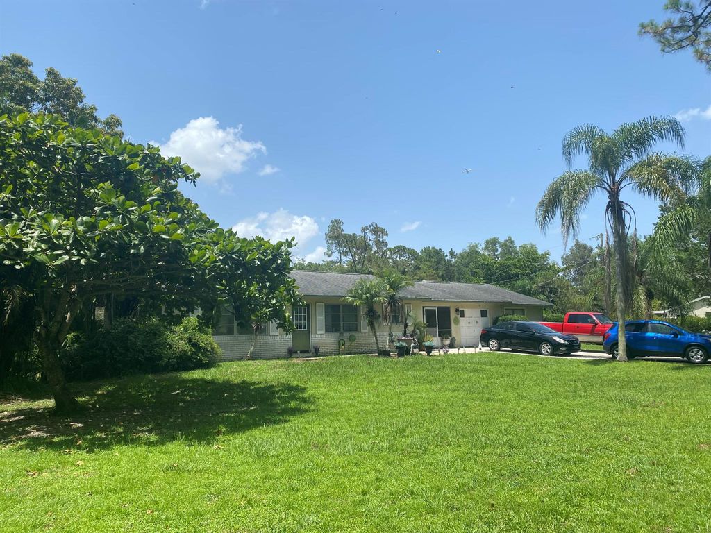 Photo of 13075 Marcella Boulevard, Loxahatchee Groves, FL 33470 (MLS # R10904971)