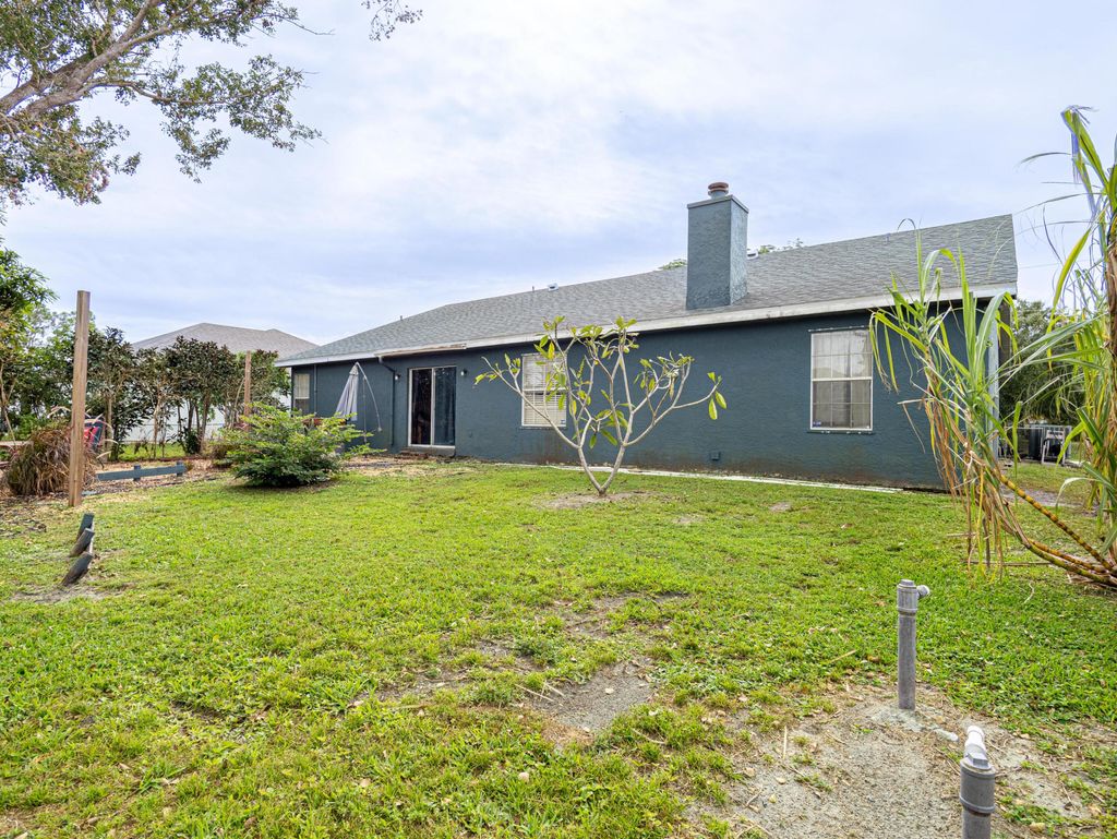 Photo of 1633 SW Gadsan Avenue, Port Saint Lucie, FL 34953 (MLS # R11034661)