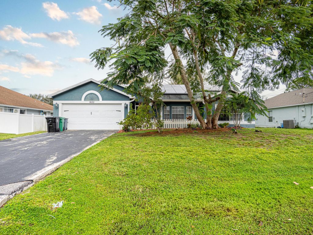 Photo of 1633 SW Gadsan Avenue, Port Saint Lucie, FL 34953 (MLS # R11034661)