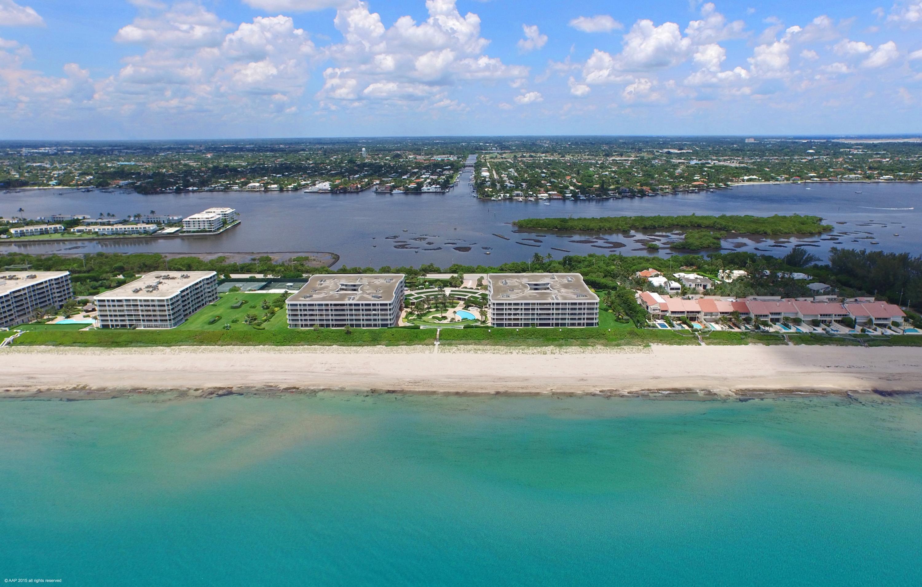Spectacular Penthouse apartment with panoramic unobstructed Intracoastal views from spacious terrace. 9 foot ceilings, beautiful marble floors and designer cabinetry. Marble bathrooms, white kitchen, and fitted closets. Offered with tasteful, neutral designer furniture decorated by Dans-Motzel. Prestigious Sloans Curve condominium includes 2 car garage parking, gatehouse, doorman, tennis center with pro, beautiful pool with pool attendant, and wide beach. Short drive to Worth Avenue, restaurants, shopping, and cultural centers. Resort living at its finest!a 2,187 per quarter assessment for 5 years approved