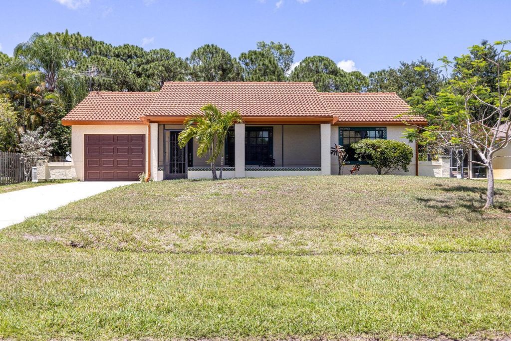 Photo of 5426 NW Clark Avenue, Port Saint Lucie, FL 34983 (MLS # R11128299)