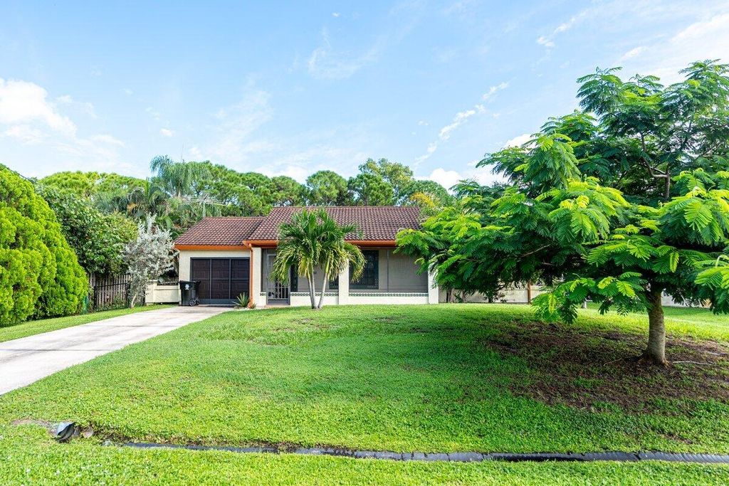 Photo of 5426 NW Clark Avenue, Port Saint Lucie, FL 34983 (MLS # R11128299)