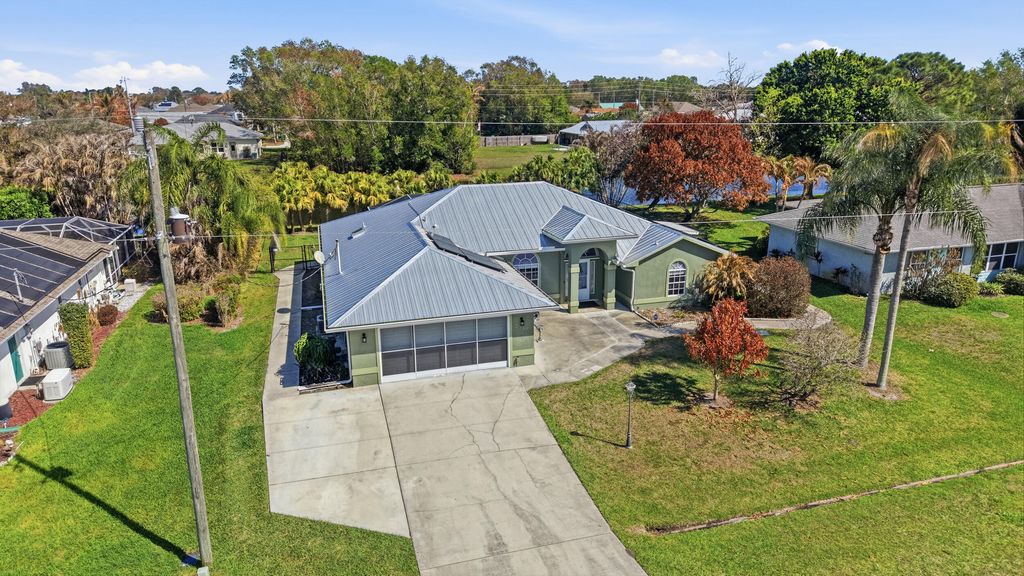 Photo of 2537 SE Hallahan St, Port Saint Lucie, FL 34952 (MLS # B26000033)