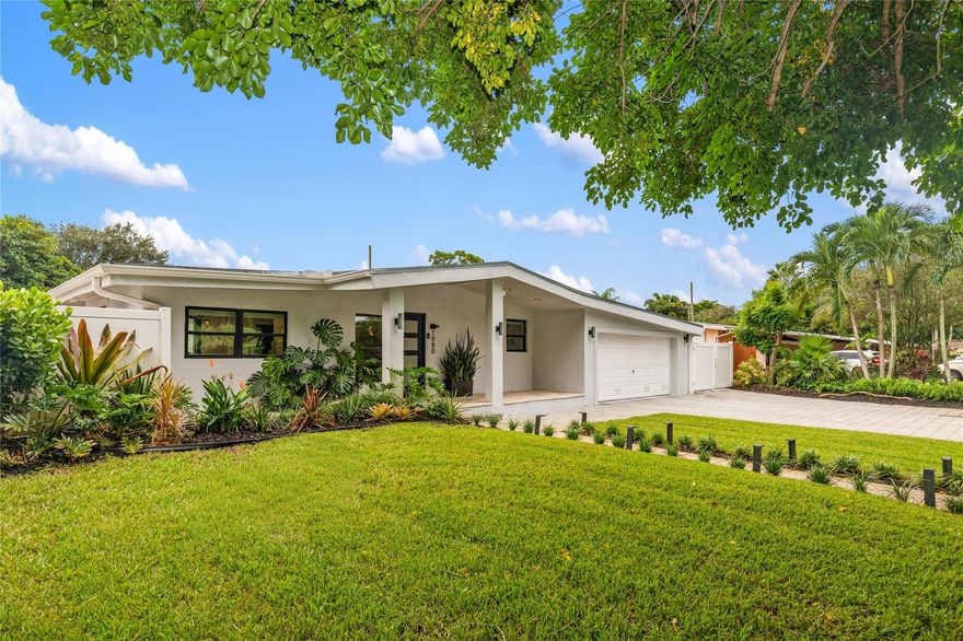 Stunning 4-bed, 3-bath home in the Country Club Estates neighborhood that sits on 1/4-acre lot, with direct view of the Fort Lauderdale Country Club Golf Course. The current owners have meticulously updated every detail, ensuring a move-in ready experience. Between 2022 and 2025, the owners remodeled kitchen cabinets, quartz countertops, new appliances, LVP flooring, baseboards, interior doors, trim, paint, a custom-built bar with marble countertops and a dedicated wine fridge. The pool was resurfaced in 2025. 2-car garage features a durable epoxy floor, and the home also includes impact front door and windows (2021), a new roof (2021), and an updated electric panel (2021) and HVAC (2019). Don’t miss the chance to own this slice of paradise in Country Club Estates.