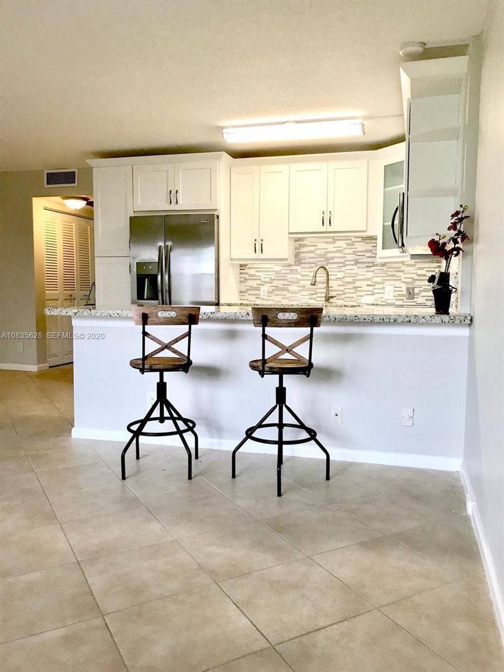 Photo of 86 Mansfield, Boca Raton, FL 33434 (MLS # B26025770)