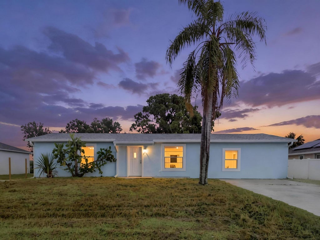 Photo of 711 NW RIVERSIDE Drive, Port Saint Lucie, FL 34983 (MLS # B26079439)