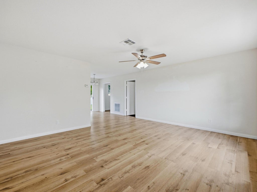 Photo of 711 NW RIVERSIDE Drive, Port Saint Lucie, FL 34983 (MLS # B26079439)