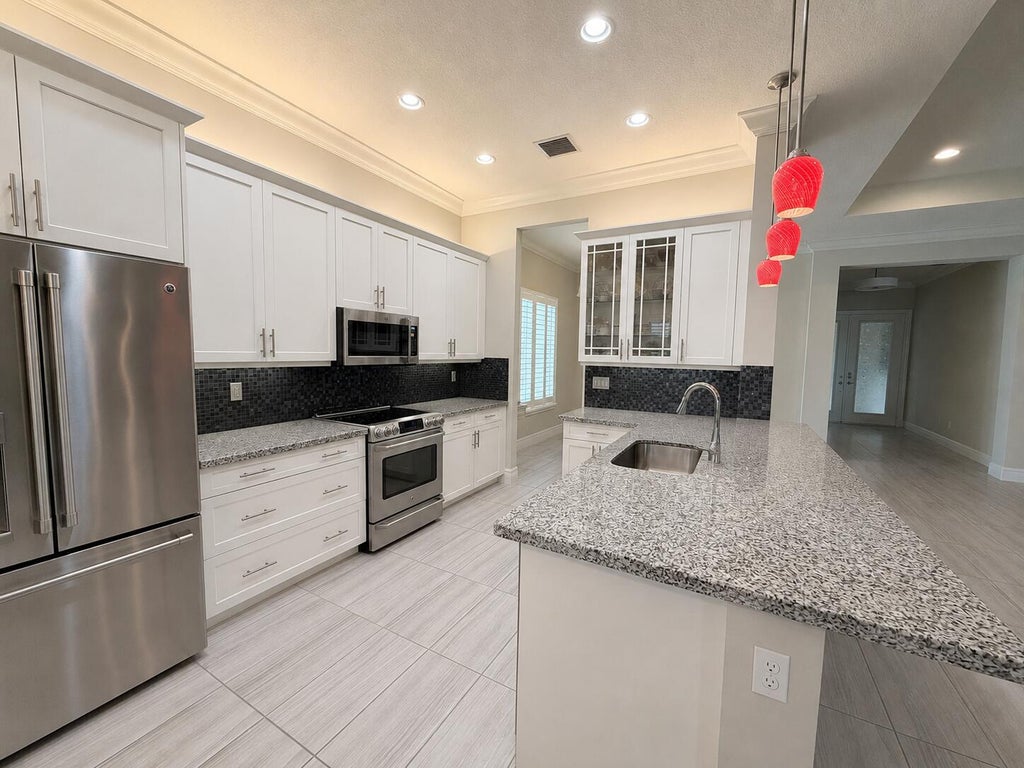 Photo of 12600 Copper Mountain Pass PASS, Boynton Beach, FL 33473 (MLS # B26059288)