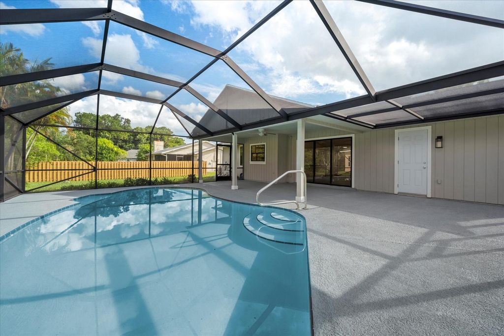 Photo of 1701 SW Tivan Lane, Port Saint Lucie, FL 34953 (MLS # R11014581)