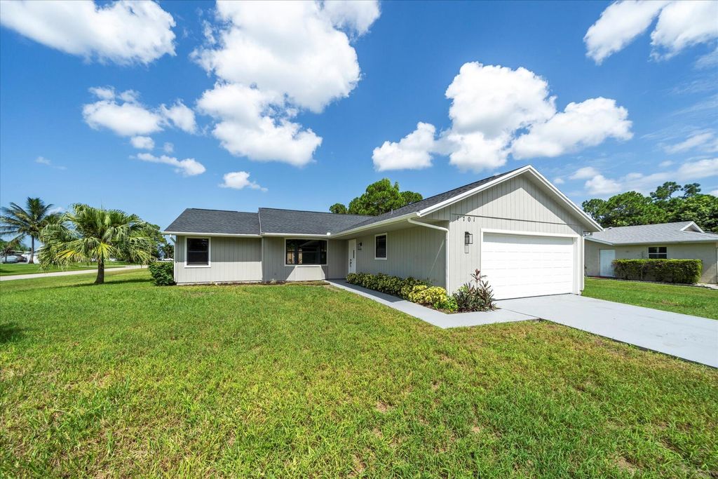Photo of 1701 SW Tivan Lane, Port Saint Lucie, FL 34953 (MLS # R11014581)