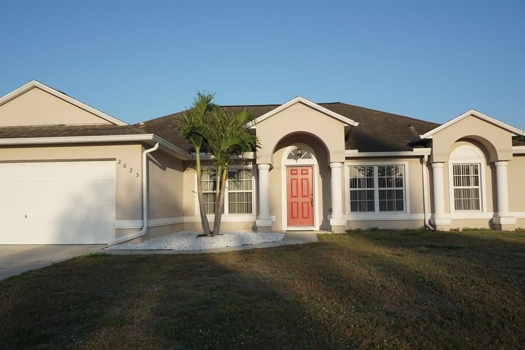 Photo of 2025 SW Americana Street, Port Saint Lucie, FL 34953 (MLS # R10872805)