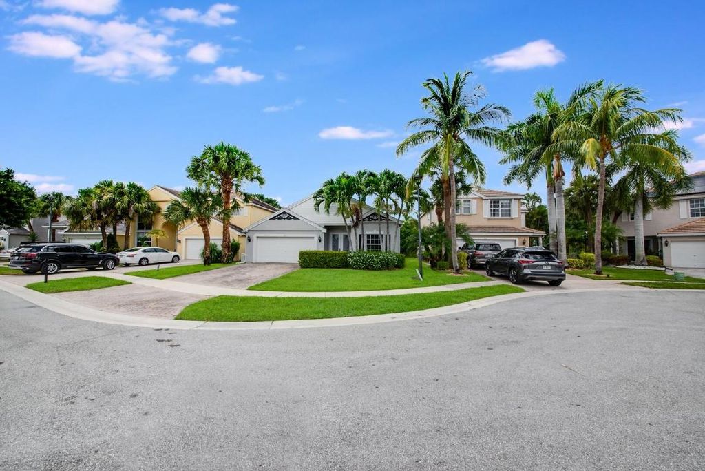 Photo of 212 Kensington Way, Royal Palm Beach, FL 33414 (MLS # R11107509)