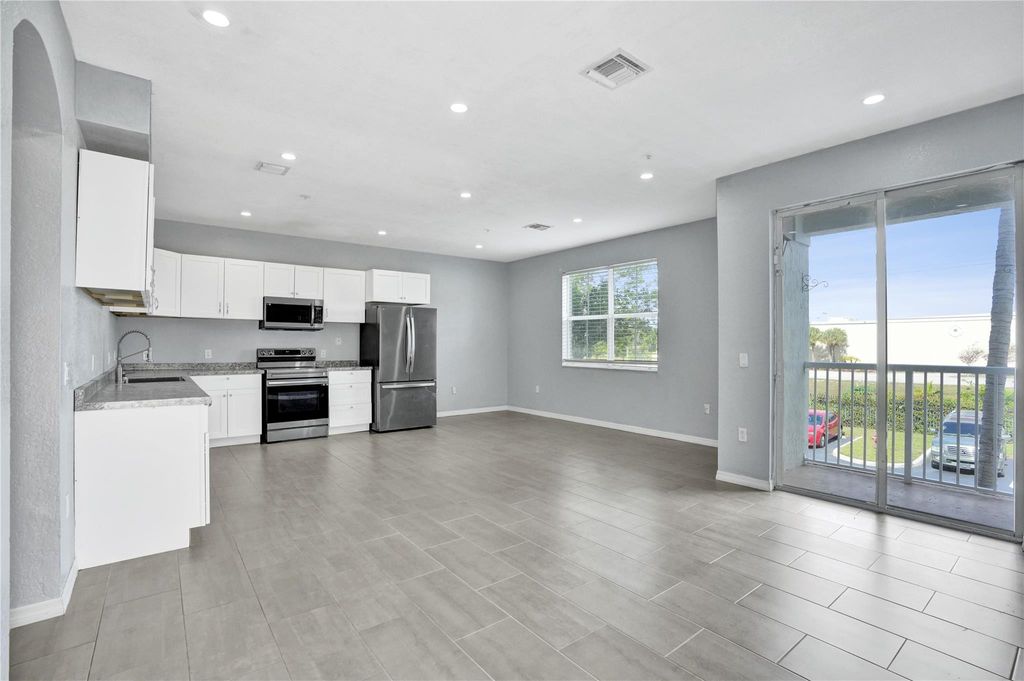 Photo of 2137 Shoma Drive #156 Bldg 17, Wellington, FL 33414 (MLS # F10552168)