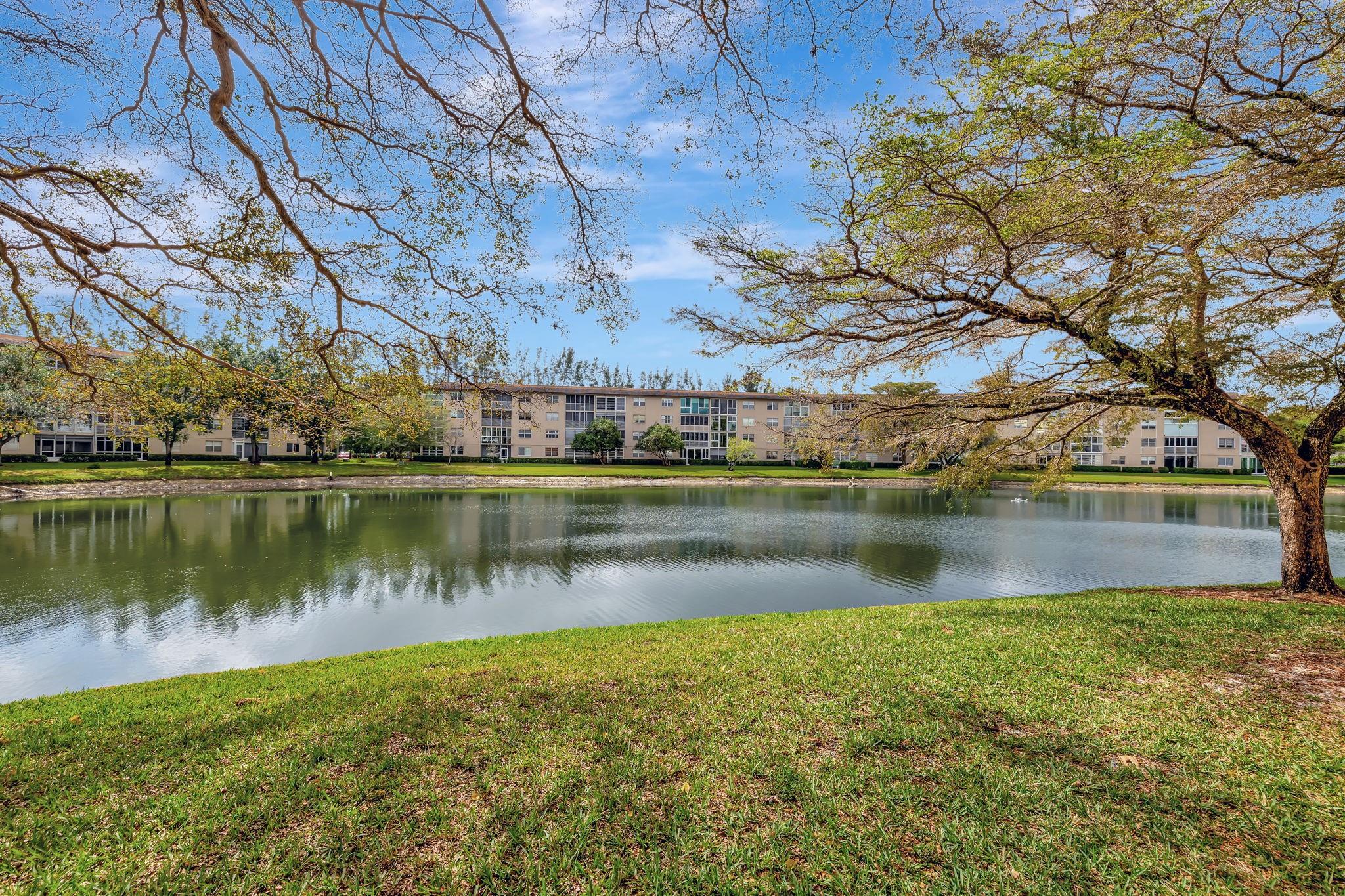 Turnkey 2 Bed, 2 Bath with Sparkling Lake & Fountain Views!
Step into this beautifully updated condo featuring a renovated kitchen with newer stainless steel appliances, granite countertops, and a custom ceiling with indirect lighting that adds a modern touch. Both bathrooms have been tastefully renovated with walk-in showers, and ceramic tile flooring runs throughout the home for easy maintenance and a sleek look.
Enjoy serene lake and fountain views from your enclosed terrace, complete with impact windows for added peace of mind. This move-in-ready gem offers comfort, style, and a tranquil setting—perfect for year-round living or a seasonal retreat.
ASSOC REQUIRES 15% DOWN & 1 OCCUP 55+