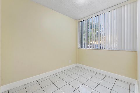 Tiny photo for 3100 NW 46th Street #102, Oakland Park, FL 33309 (MLS # B26026826)