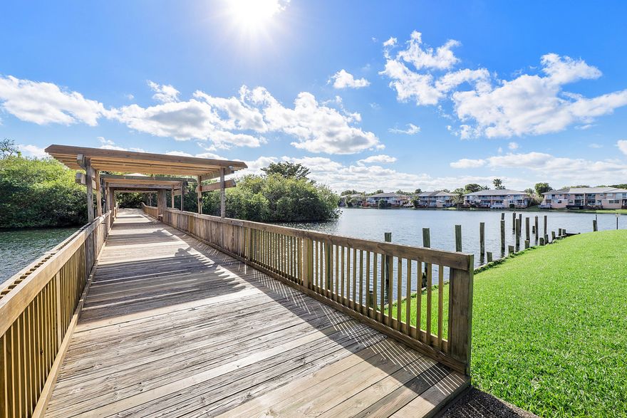 LAKE VIEWS & ENDLESS POTENTIAL! This spacious 2-bedroom, 2-bath condo offers beautiful lake views from both the living room and primary bedroom inside a secure gated community. A great opportunity for a buyer ready to add their personal touch and make it their own. Features include granite countertops, in-unit washer/dryer, and access to resort-style amenities including tennis courts, pool, gym, basketball court, and more. Conveniently located near shopping, dining, and major highways. Whether you're looking for a primary residence or investment opportunity, this condo is full of possibilities!