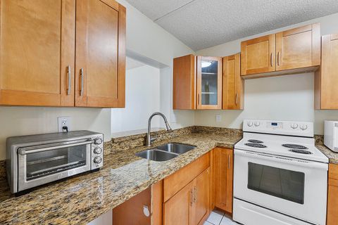 Tiny photo for 3100 NW 46th Street #102, Oakland Park, FL 33309 (MLS # B26026826)