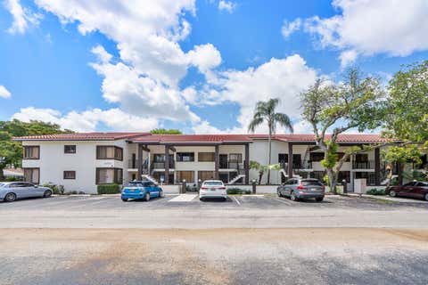 Photo of 3100 NW 46th Street #102, Oakland Park, FL 33309 (MLS # B26026826)