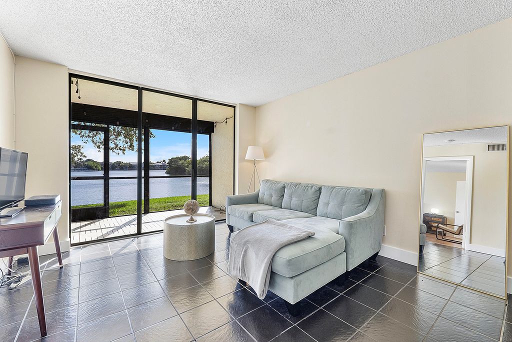 Photo of 3100 NW 46th Street #102, Oakland Park, FL 33309 (MLS # B26026826)