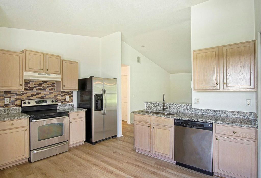 Photo of 373 SW Columbus Drive, Port Saint Lucie, FL 34953 (MLS # R11015633)