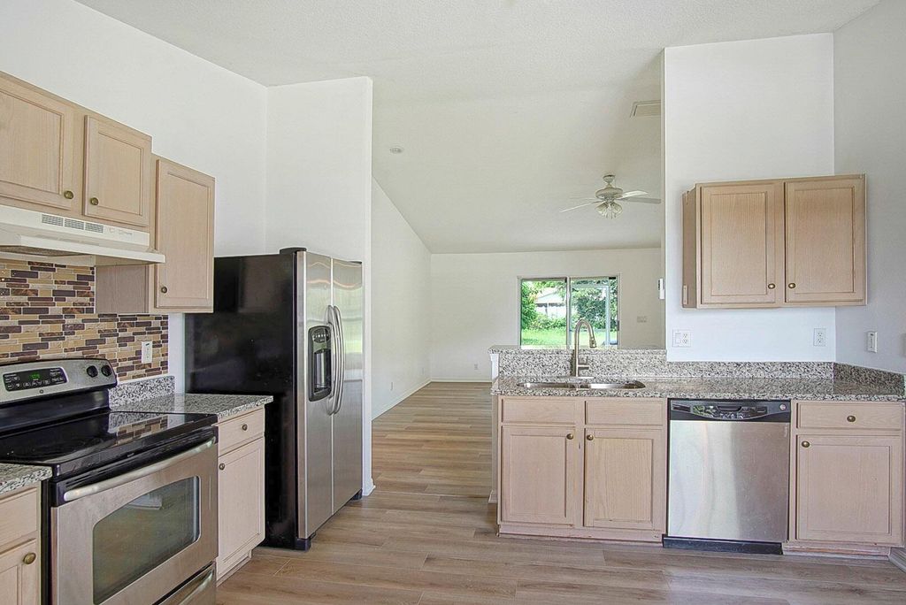 Photo of 373 SW Columbus Drive, Port Saint Lucie, FL 34953 (MLS # R11015633)