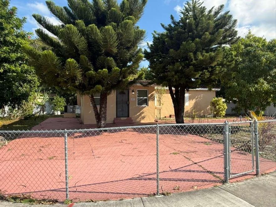 Step into this charming Miami Gardens corner-lot home offering 3 bedrooms and 2 bathrooms, designed for comfort and convenience. Featuring a newer roof and AC, this property is move-in ready with plenty of upgrades. The spacious kitchen boasts stainless steel appliances, wood cabinets, and tile flooring throughout for easy maintenance. Enjoy the versatility of a detached storage unit plus a separate laundry/workshop space—perfect for hobbies. The large, fully fenced driveway provides ample parking and privacy, making it ideal for gatherings or family living. With its prime location and thoughtful features, this home is a rare find that blends functionality with Florida lifestyle charm.