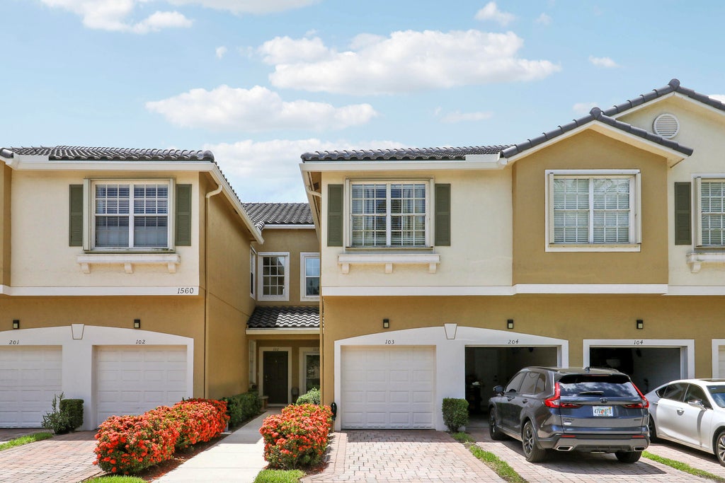 Photo of 1560 SE Sheffield Terrace N #103, Stuart, FL 34994 (MLS # B26050529)