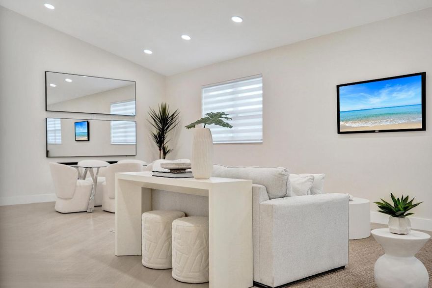 Welcome home to your private resort in gated Polo Trace! This fully renovated 4-BR, 2-BA beauty lives large with soaring ceilings, NEW 2025 roof. Italian porcelain tile floors laid in a stunning herringbone pattern. The gourmet kitchen features quartz countertops, custom cabinetry, and stainless-steel appliances flowing seamlessly into open living and dining areas, suited for entertaining. A spa-like primary suite offers dual vanities, and a luxe dual shower heads. Three additional bedrooms, perfect for guests, family members or a home office, share an upgraded bathroom featuring modern tile, stylish fixtures and a tub/shower combination. The community offers world-class amenities: a spectacular clubhouse with restaurant/bar, resort and lap pools, tennis, pickleball, fitness center +