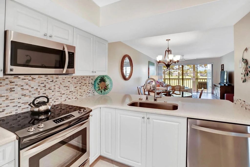 Photo of 316 Brackenwood Circle #316, Palm Beach Gardens, FL 33418 (MLS # R10958758)