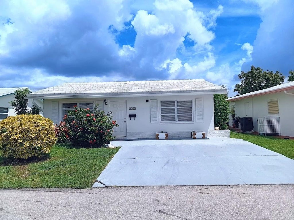 Photo of 7105 NW 74th Place, Tamarac, FL 33321 (MLS # B26062061)