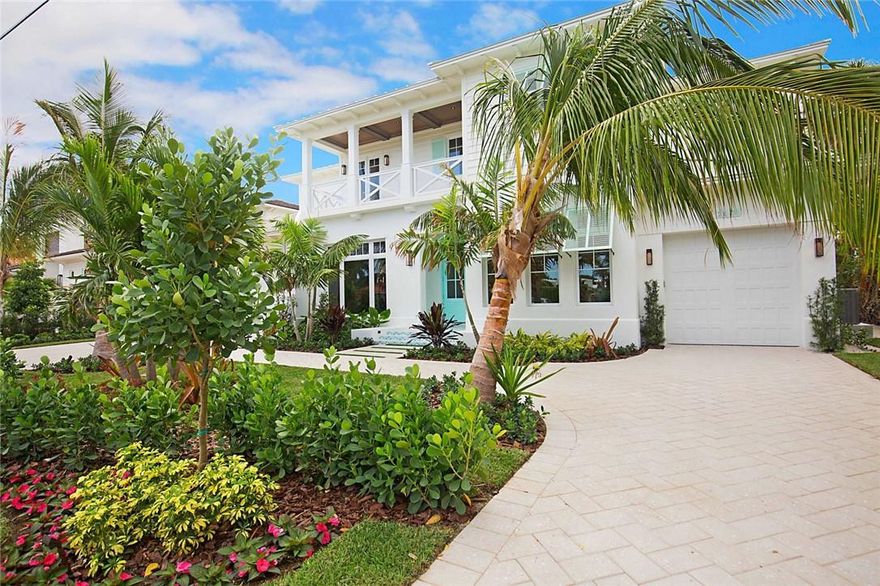 Just completed! Classic Coastal Style home with stunning long water views meticulously designed with the best of finishes by award winning Interior Designer, Bridget Conway of Lighthouse Interiors and Architect Randall Stofft. This open and water-oriented home is a beautifully finished and staged. The impressive light living spaces with water filled views are ideal for the South Florida lifestyle with accents of cohesive color pallets. Amenities include; 5 bedrooms, 6 1/2 baths, club room, loft entertainment area, wine room, wet bar, amazing kitchen and lovely master suite. Gorgeous pool and unbelievable outdoor entertainment room with summer kitchen. The panoramic water views make this the home that will delight your most important guests. Just one turn and you are on the Hillsboro Inlet!
