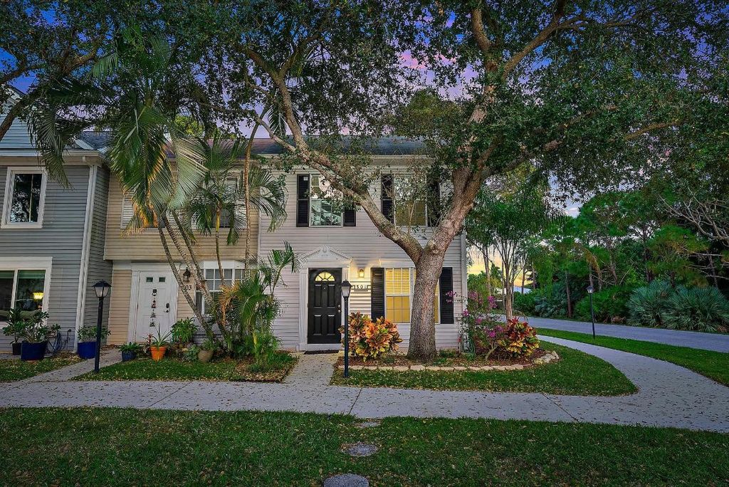 Photo of 301 Georgian Park Drive, Jupiter, FL 33458 (MLS # R11092595)